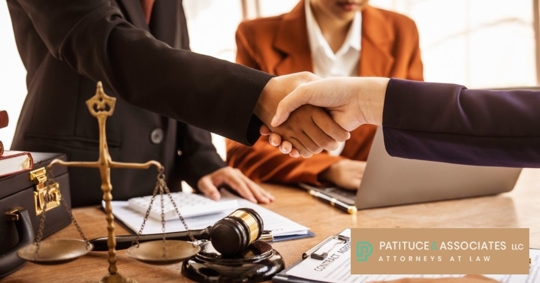 Man shaking attorneys hand