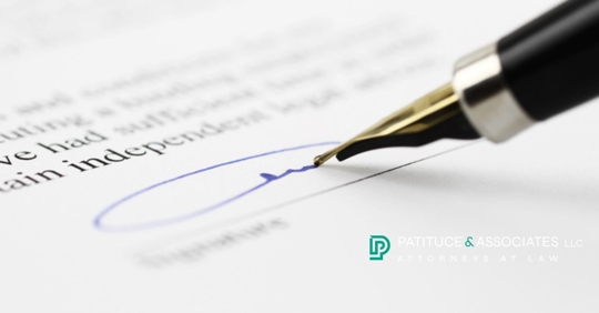 a pen signs on the signature line of a plea bargain